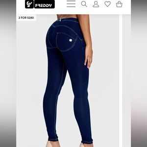 Mid rise dark wash with yellow stitching full length Freddy jeans